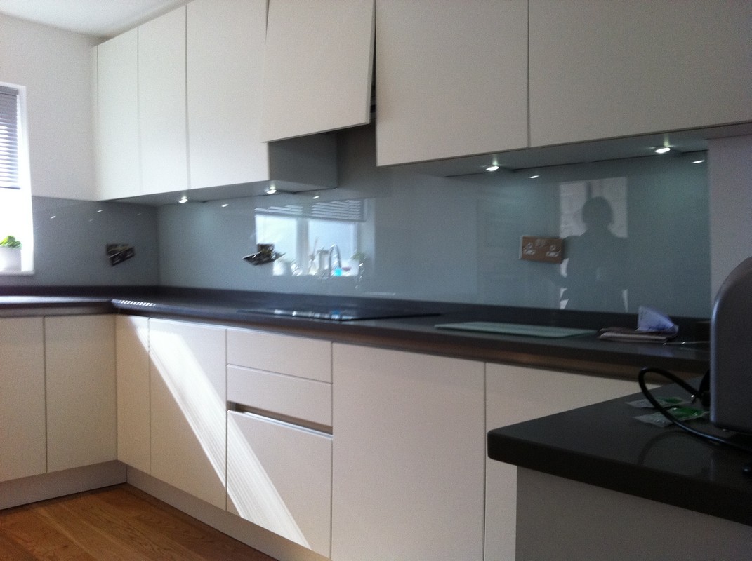Grey glass kitchen splashback with LED lighting in Grove Park