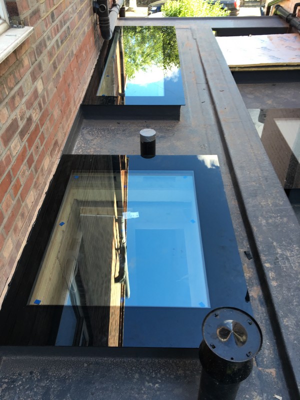 Multiple flat roof skylights on extension in Grove Park